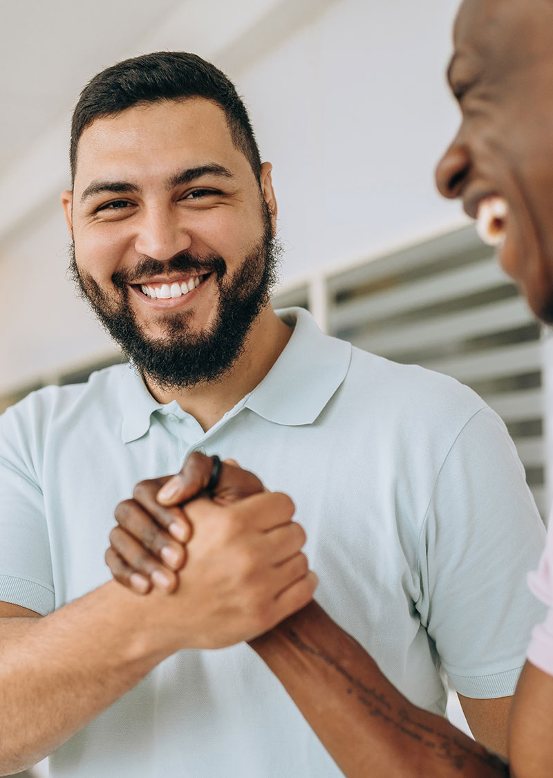 Partner friends shaking hands